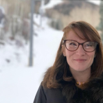 Picture of Rachel smiling with snow in the background